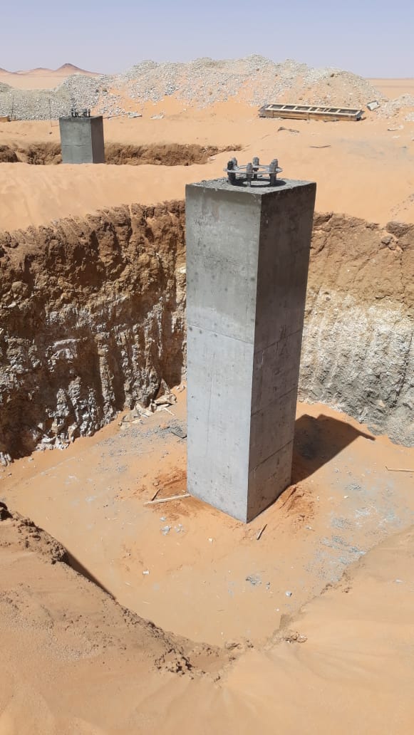 Concrete pedestal and anchor bolts after formwork removal.